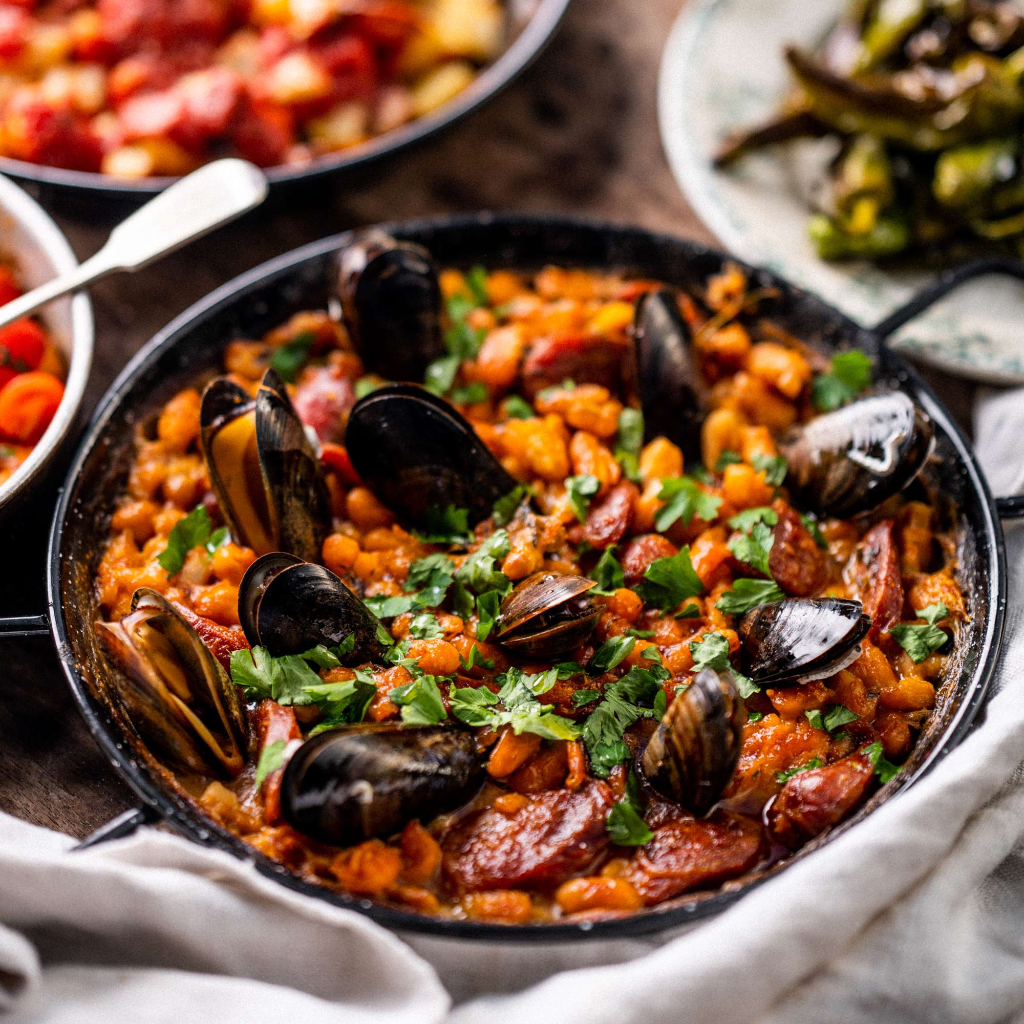 Baked chorizo, mussels and butter beans